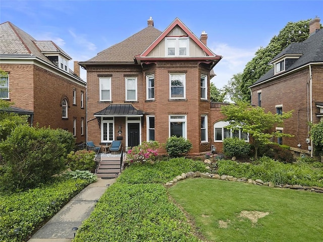 194 Beaver St, Beaver, PA 15009 - view of front of home with brick siding, a front lawn, and a chimney