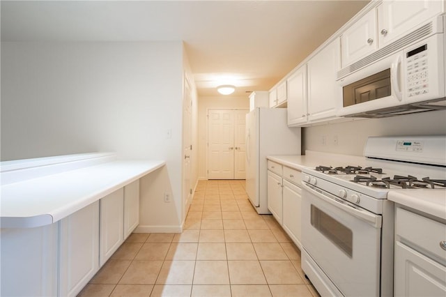6055 Triple Crown Cir, Hempfield Twp Wml, PA 15601 - kitchen with white appliances, white cabinetry, light tile patterned floors, and light countertops