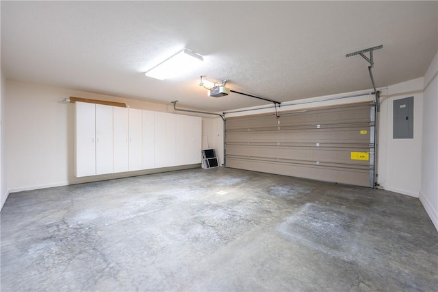 6055 Triple Crown Cir, Hempfield Twp Wml, PA 15601 - garage featuring electric panel, baseboards, and a garage door opener