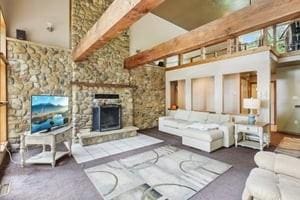 929 Al Smith Dr, Kennedy Twp, PA 15136 - living room with a fireplace, a towering ceiling, and beam ceiling