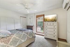 929 Al Smith Dr, Kennedy Twp, PA 15136 - bedroom featuring a wall unit AC and a ceiling fan