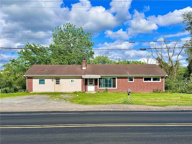 3406 New Castle, West Middlesex Boro, PA 16159 - ranch-style house featuring brick siding, a front yard, and a chimney