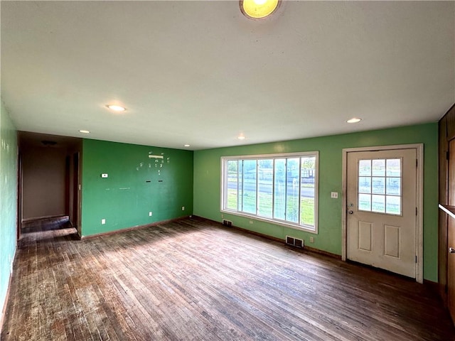 3406 New Castle, West Middlesex Boro, PA 16159 - unfurnished living room featuring dark wood finished floors, plenty of natural light, recessed lighting, and baseboards