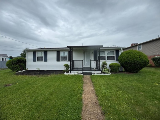 201 King St, Perryopolis, PA 15473 - view of front of house featuring a front yard
