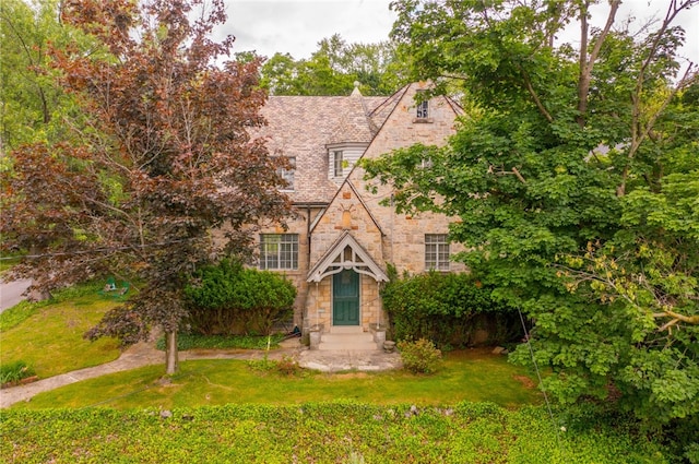 2 Crescent Dr, Mt Lebanon, PA 15228 - english style home featuring stone siding, a front yard, and a high end roof