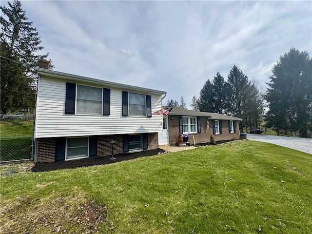 1060 Sugar Run Rd, Nottingham, PA 15367 - tri-level home with brick siding and a chimney