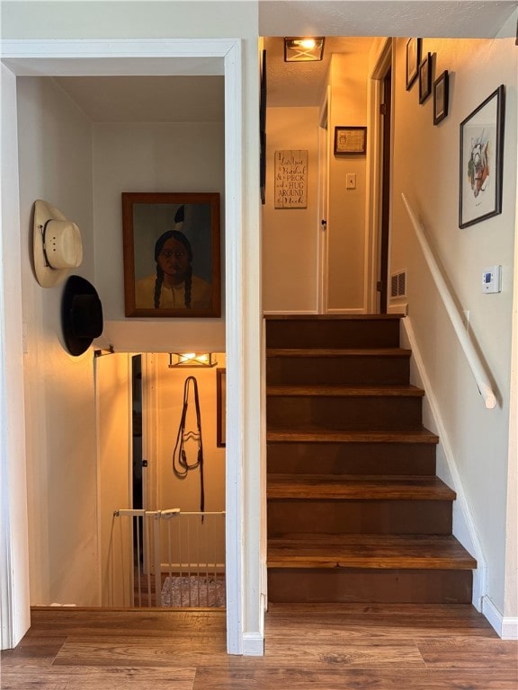1060 Sugar Run Rd, Nottingham, PA 15367 - stairway featuring wood finished floors