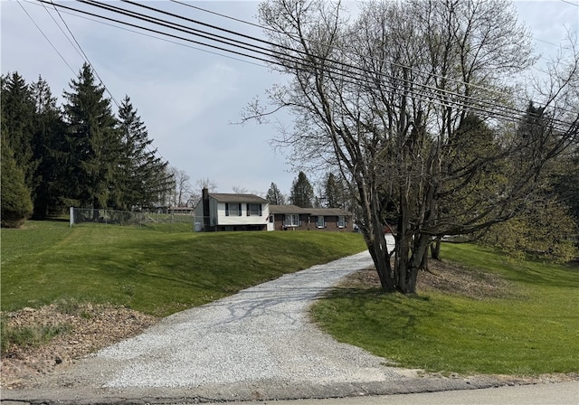 1060 Sugar Run Rd, Nottingham, PA 15367 - view of front of house with gravel driveway and a front lawn