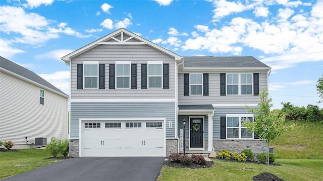 420 Fosse Ct, Harmony Boro But, PA 16037 - craftsman house featuring stone siding, asphalt driveway, central air condition unit, and a front lawn