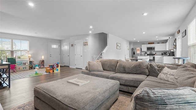 420 Fosse Ct, Harmony Boro But, PA 16037 - living area with light wood-style flooring, recessed lighting, and stairway