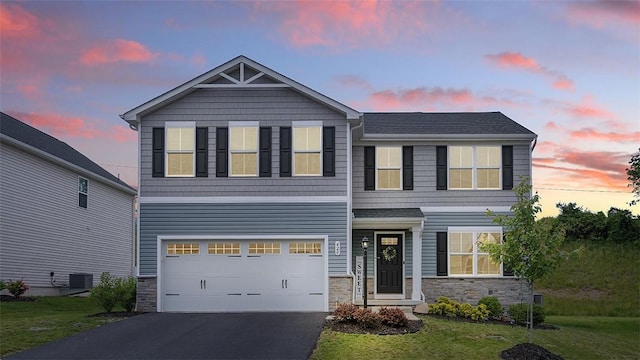 420 Fosse Ct, Harmony Boro But, PA 16037 - view of front of property with stone siding, driveway, cooling unit, and a front yard