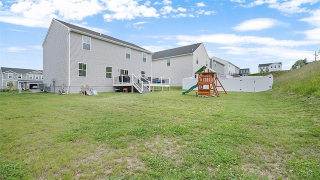 420 Fosse Ct, Harmony Boro But, PA 16037 - rear view of house with a playground