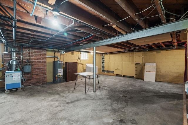 191 Clearview, West View, PA 15229 - basement with gas water heater, washer / clothes dryer, and a heating unit