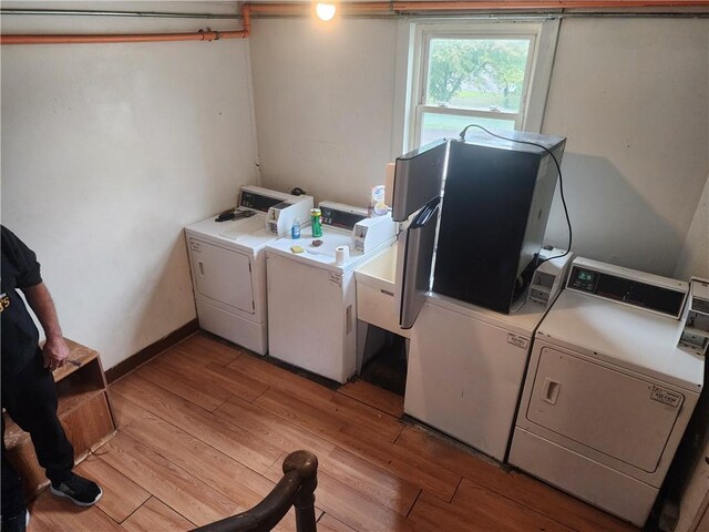 1160 Murray Ave, Unity Twp, PA 15650 - washroom featuring independent washer and dryer and light wood-type flooring
