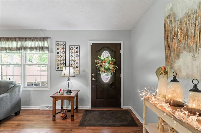 763 Chapel Rd, Center Twp Bea, PA 15001 - foyer entrance featuring wood finished floors, baseboards, and a textured ceiling