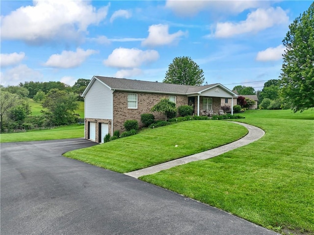 763 Chapel Rd, Center Twp Bea, PA 15001 - ranch-style home with brick siding, a garage, driveway, and a front yard