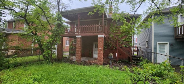 225 Keystone Way, Ellwood City Law, PA 16117 - rear view of property with stairway, brick siding, and a deck