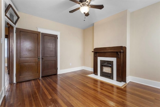 2938 Voelkel Ave, Dormont, PA 15216 - unfurnished living room with ceiling fan, wood finished floors, baseboards, and a fireplace with flush hearth