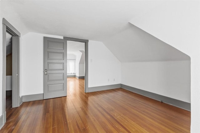 2938 Voelkel Ave, Dormont, PA 15216 - additional living space with hardwood / wood-style floors, vaulted ceiling, and baseboards