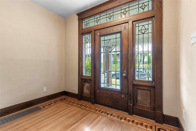 2938 Voelkel Ave, Dormont, PA 15216 - foyer featuring wood finished floors, baseboards, and plenty of natural light