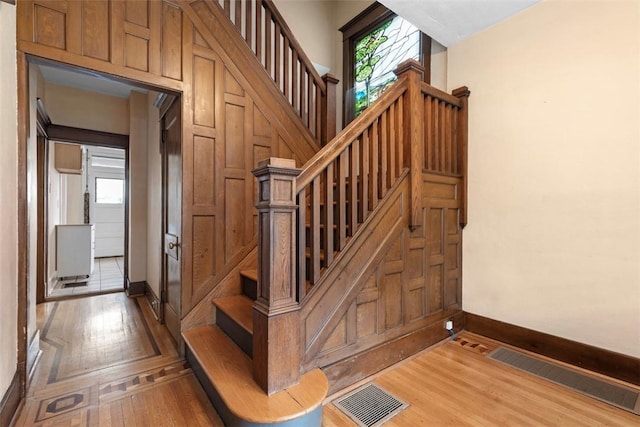 2938 Voelkel Ave, Dormont, PA 15216 - stairs featuring baseboards and wood finished floors