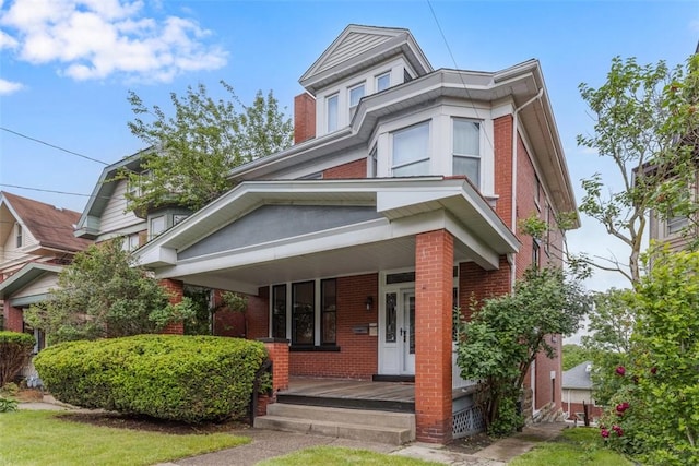 2938 Voelkel Ave, Dormont, PA 15216 - american foursquare style home featuring brick siding and a porch