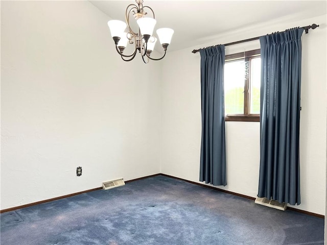 4130 James Dr, Lower Burrell, PA 15068 - unfurnished room with a chandelier, dark colored carpet, and baseboards