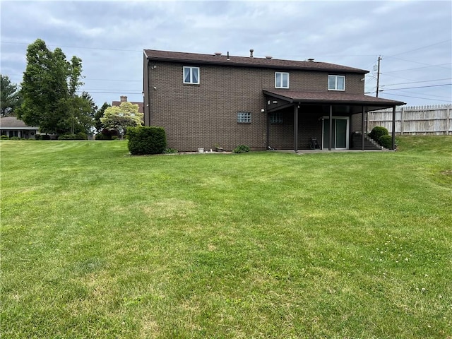 4130 James Dr, Lower Burrell, PA 15068 - rear view of house featuring brick siding