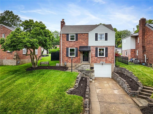 5268 Fieldcrest Dr, Whitehall, PA 15236 - traditional-style house featuring brick siding, a chimney, concrete driveway, and a garage