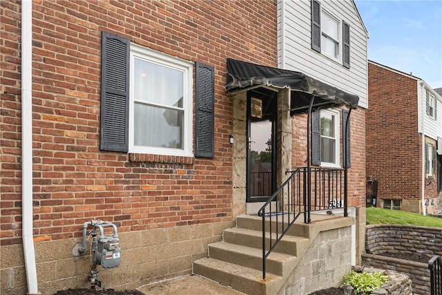 5268 Fieldcrest Dr, Whitehall, PA 15236 - doorway to property with brick siding and crawl space