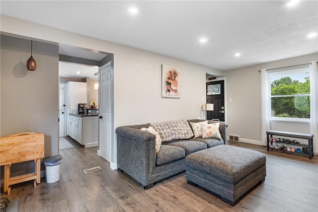 5268 Fieldcrest Dr, Whitehall, PA 15236 - living room with wood finished floors, recessed lighting, and baseboards
