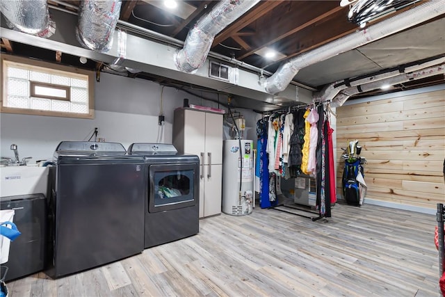 5268 Fieldcrest Dr, Whitehall, PA 15236 - laundry area featuring gas water heater, washing machine and dryer, wood finished floors, and heating unit