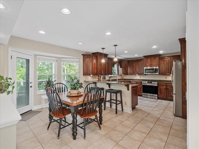 13 Westchester Ct, Robinson Twp Nwa, PA 15136 - dining room with recessed lighting, light tile patterned flooring, and baseboards