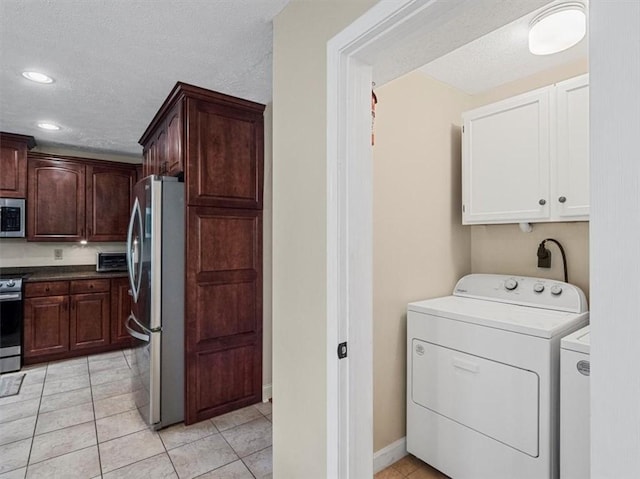 13 Westchester Ct, Robinson Twp Nwa, PA 15136 - laundry area featuring washing machine and dryer, a textured ceiling, light tile patterned floors, cabinet space, and recessed lighting