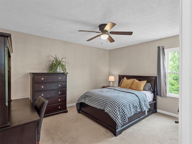 13 Westchester Ct, Robinson Twp Nwa, PA 15136 - carpeted bedroom with multiple windows, a textured ceiling, ceiling fan, and baseboards