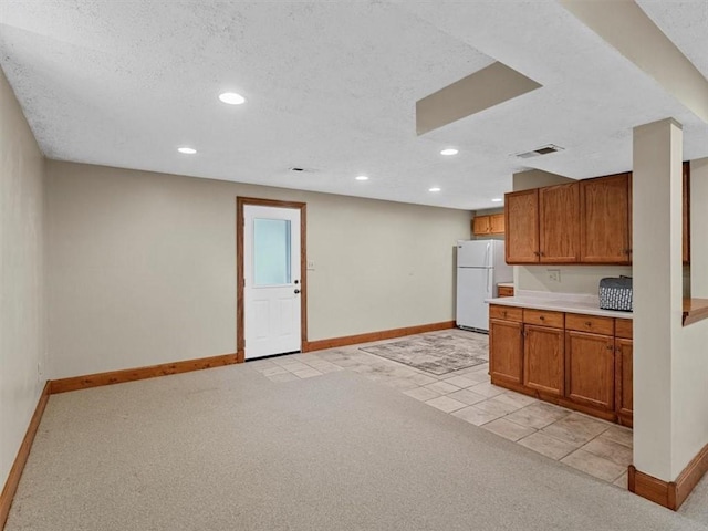 13 Westchester Ct, Robinson Twp Nwa, PA 15136 - kitchen featuring freestanding refrigerator, baseboards, brown cabinets, light carpet, and recessed lighting