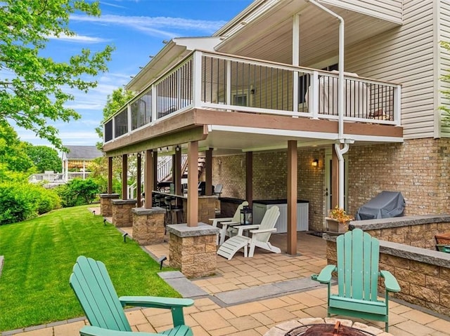 13 Westchester Ct, Robinson Twp Nwa, PA 15136 - rear view of property with a patio area, a yard, an outdoor fire pit, a sunroom, and brick siding