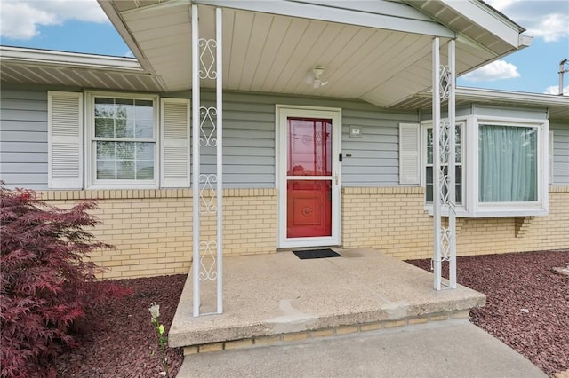 1509 Edmon Rd, Kiskiminetas Twp, PA 15618 - doorway to property featuring covered porch and brick siding