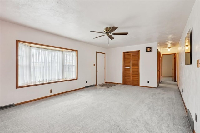1509 Edmon Rd, Kiskiminetas Twp, PA 15618 - unfurnished room with light colored carpet, ceiling fan, and baseboards