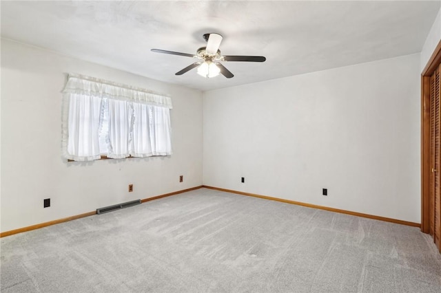 1509 Edmon Rd, Kiskiminetas Twp, PA 15618 - empty room with light carpet, ceiling fan, and baseboards