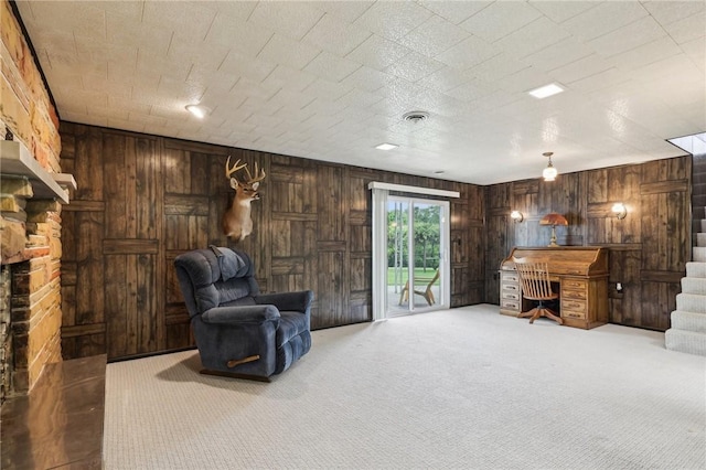 1509 Edmon Rd, Kiskiminetas Twp, PA 15618 - living area with carpet flooring, wood walls, and stairs