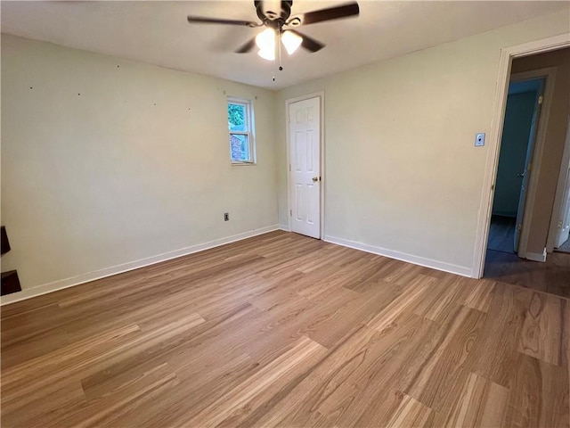3329 Recker Dr, Baldwin Boro, PA 15227 - unfurnished room with light wood finished floors, a ceiling fan, and baseboards