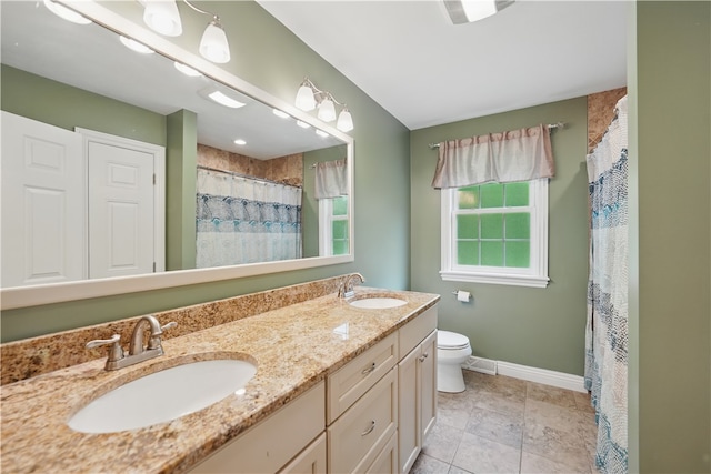 1125 Annisville Rd, Washington Twp But, PA 16050 - full bathroom with double vanity, toilet, baseboards, and curtained shower