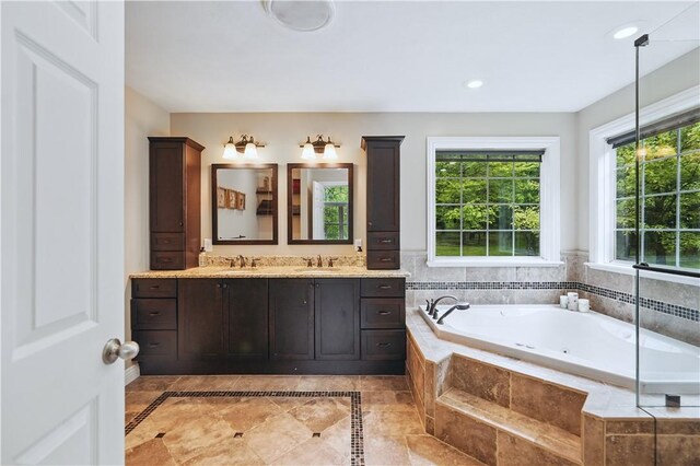 1125 Annisville Rd, Washington Twp But, PA 16050 - bathroom with double vanity, a whirlpool tub, tile patterned floors, and recessed lighting