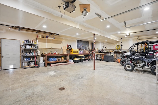 1125 Annisville Rd, Washington Twp But, PA 16050 - garage featuring a workshop area and a garage door opener