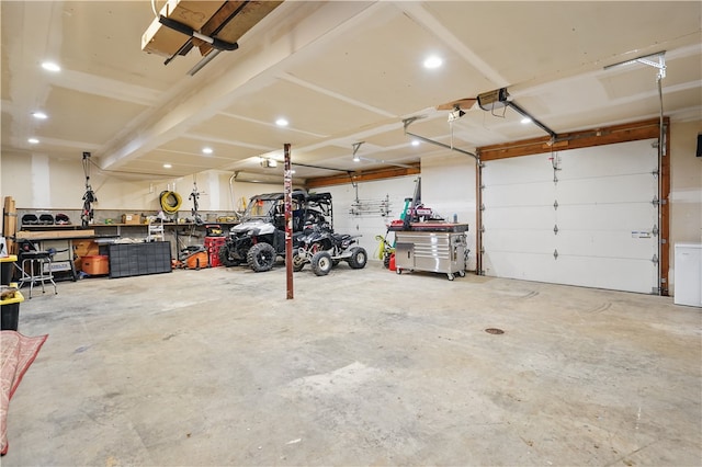 1125 Annisville Rd, Washington Twp But, PA 16050 - garage featuring a workshop area and a garage door opener