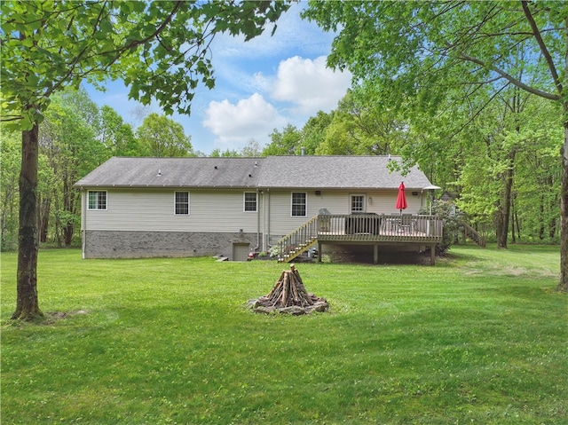 1125 Annisville Rd, Washington Twp But, PA 16050 - rear view of house featuring a wooden deck and a lawn