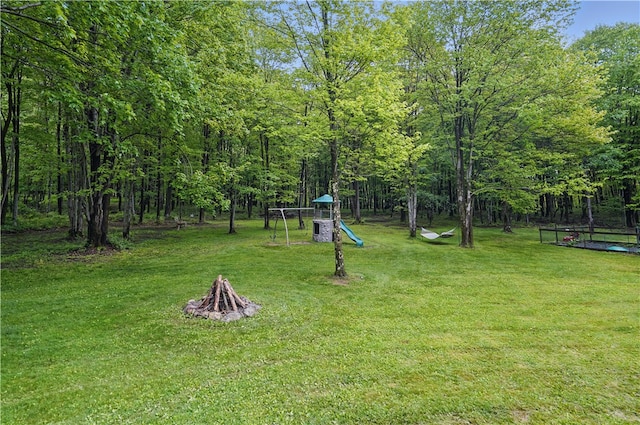 1125 Annisville Rd, Washington Twp But, PA 16050 - view of green lawn featuring a fire pit