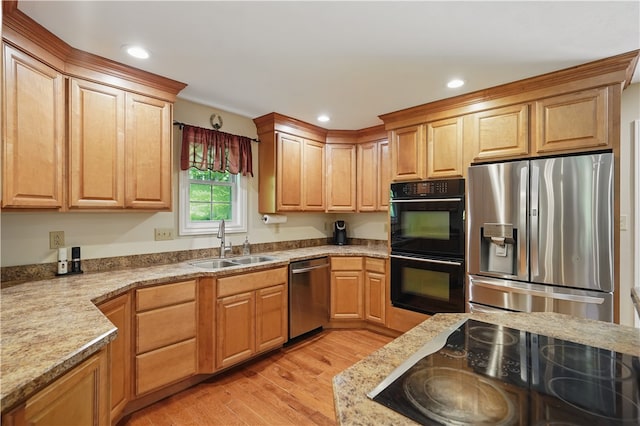 1125 Annisville Rd, Washington Twp But, PA 16050 - kitchen featuring black appliances, a sink, light wood-type flooring, and recessed lighting