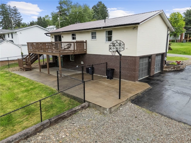 174 Hague Ln, South Union Twp, PA 15401 - rear view of house with a deck, stairway, metal roof, and a patio